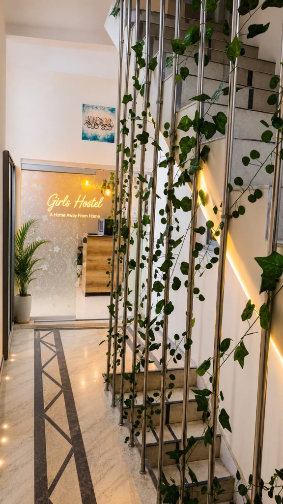 Staircase with Vines and Neon Sign